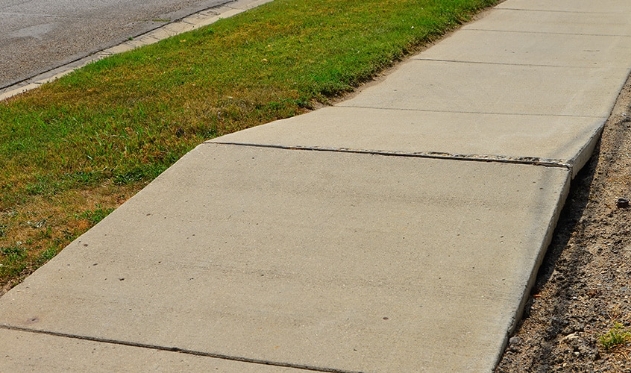 uneven concrete sidewalk