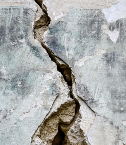 cracked broken concrete wall